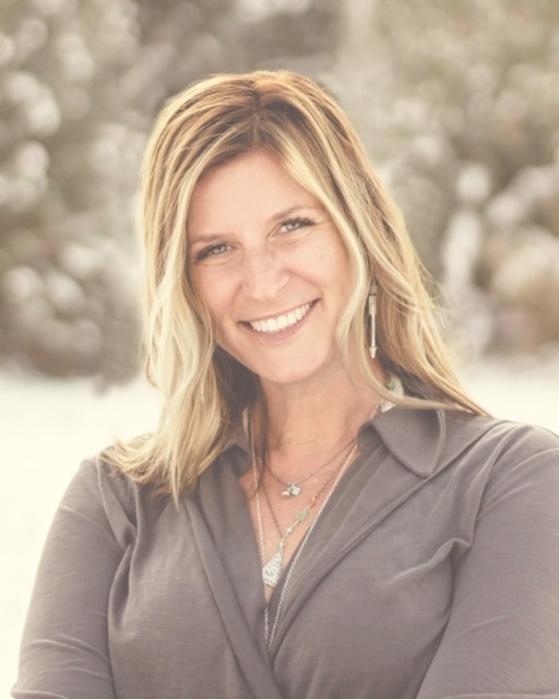 a photo of angie shireman looking right at camera and smiling