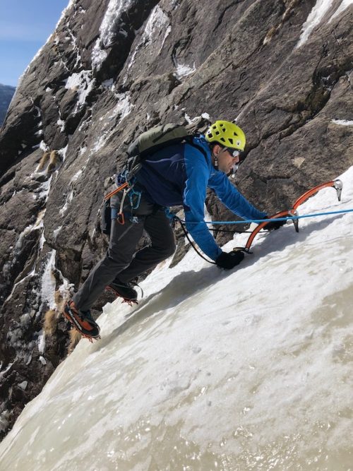a photo of erik weihenmayer climbing into sunshine